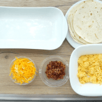 Eggs and Bacon Breakfast Enchiladas